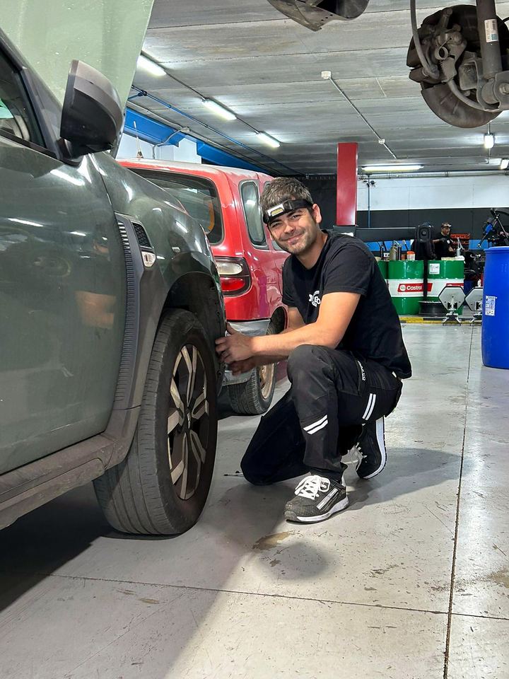 Mechanic checking a wheel